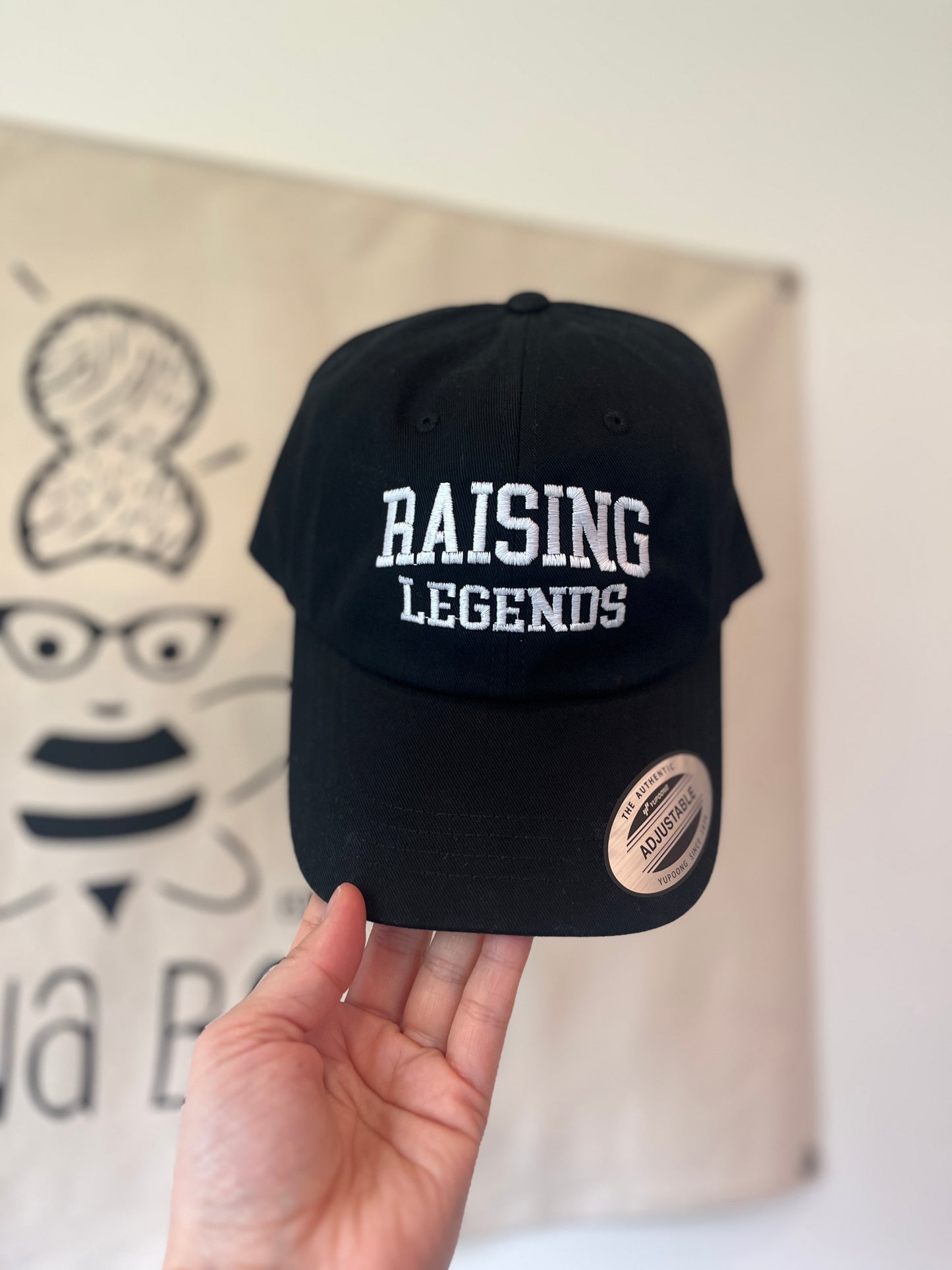Raising Legends Embroidered Hat – Adjustable Black Baseball Cap | Parent Gift